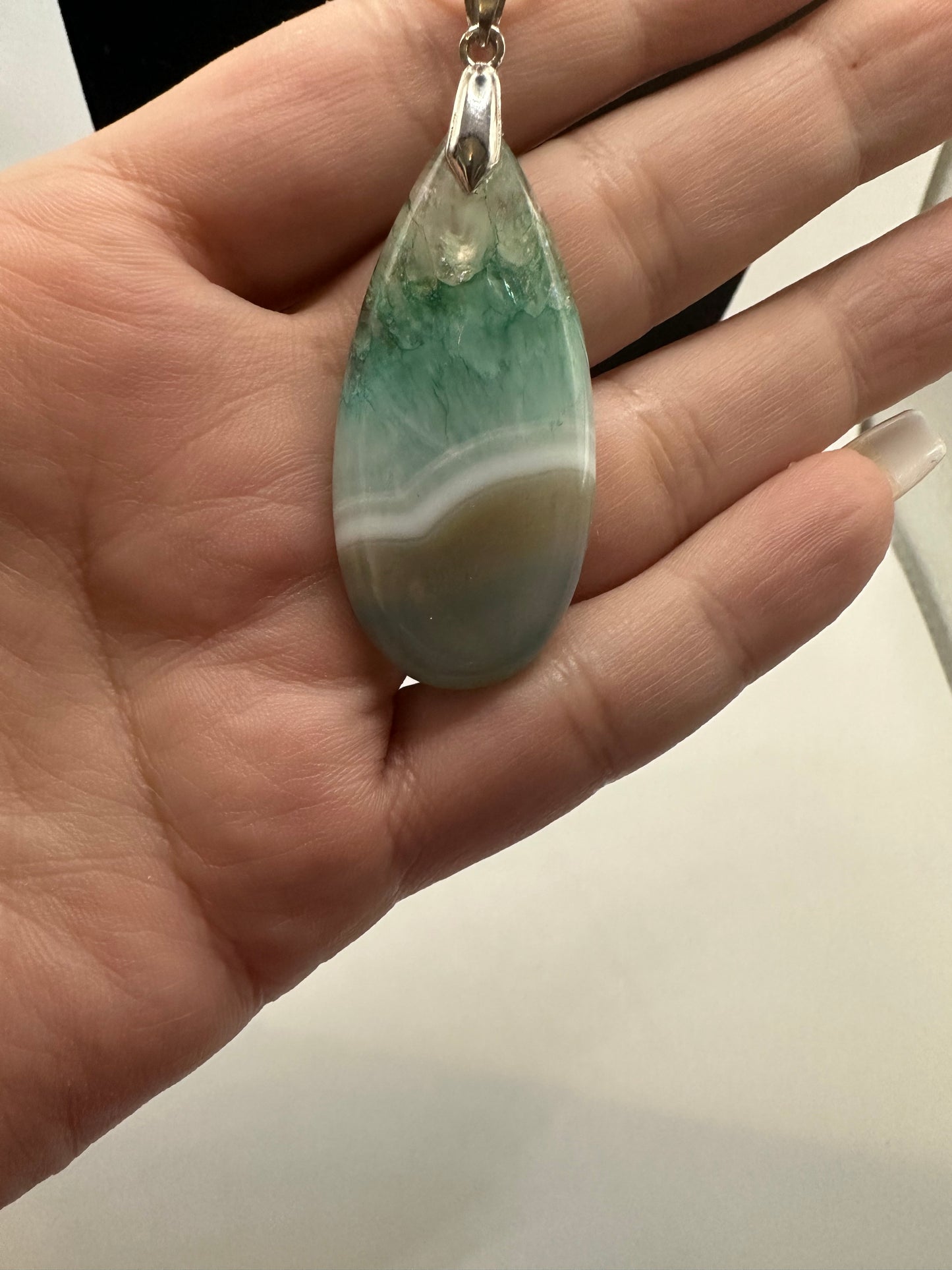 Banded agate pendant on a sterling silver chain