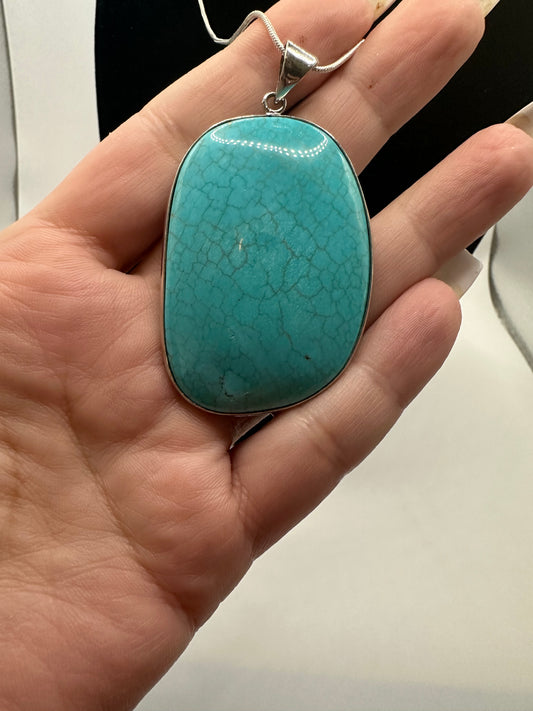 Turquoise pendant on sterling silver chain